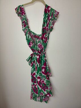 NWOT. Great wrap dress by Feather & Find. Size S